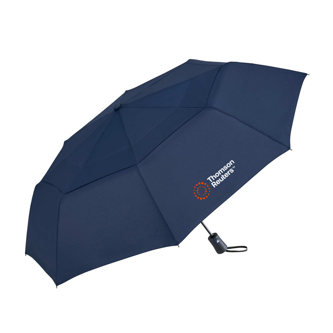 A navy blue folding umbrella with the 'Thomson Reuters' logo printed in white and orange on the canopy, shown against a plain white background.