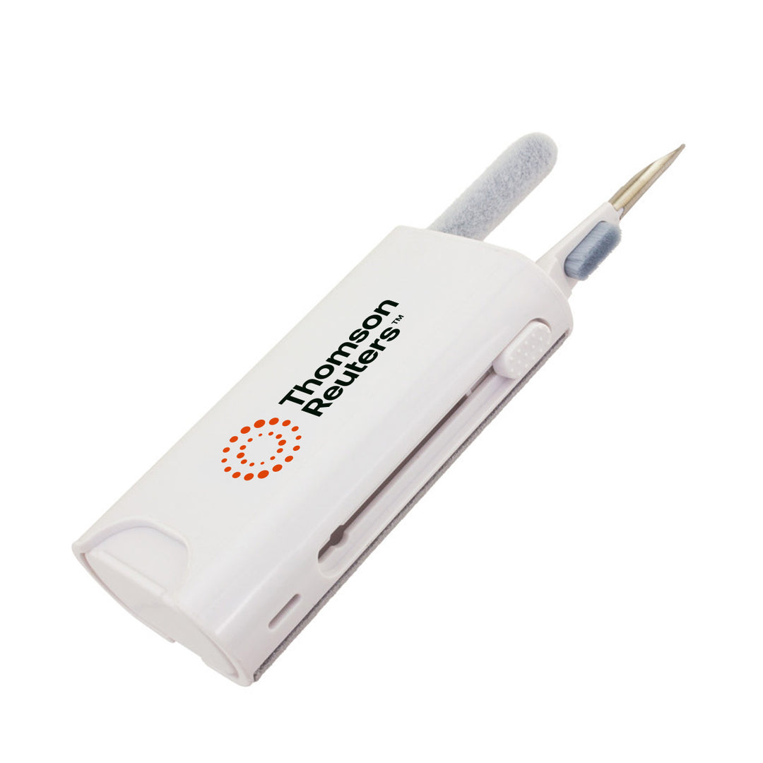 A white handheld cleaning device with a gray foam attachment and a metal needle-like tip, shown on a plain white background. The device has the 'Thomson Reuters' brand name and logo printed on it.