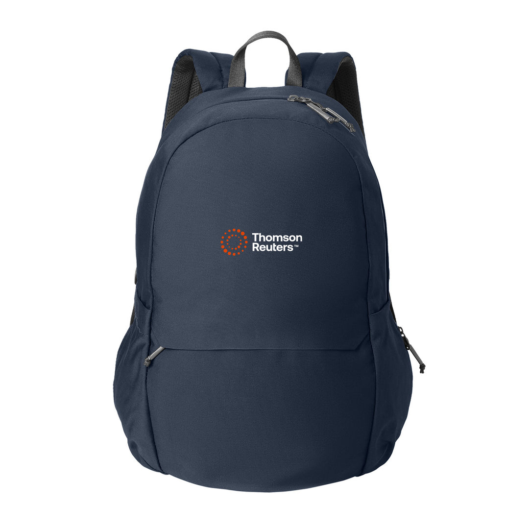 A navy blue backpack with a front zippered pocket and a printed Thomson Reuters logo with white text and the orange icon in the center of the navy backpack 