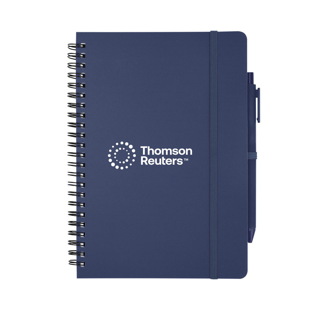A navy blue spiral-bound notebook with an elastic closure band and a matching pen attached on the side. The front cover features the white Thomson Reuters logo and name.